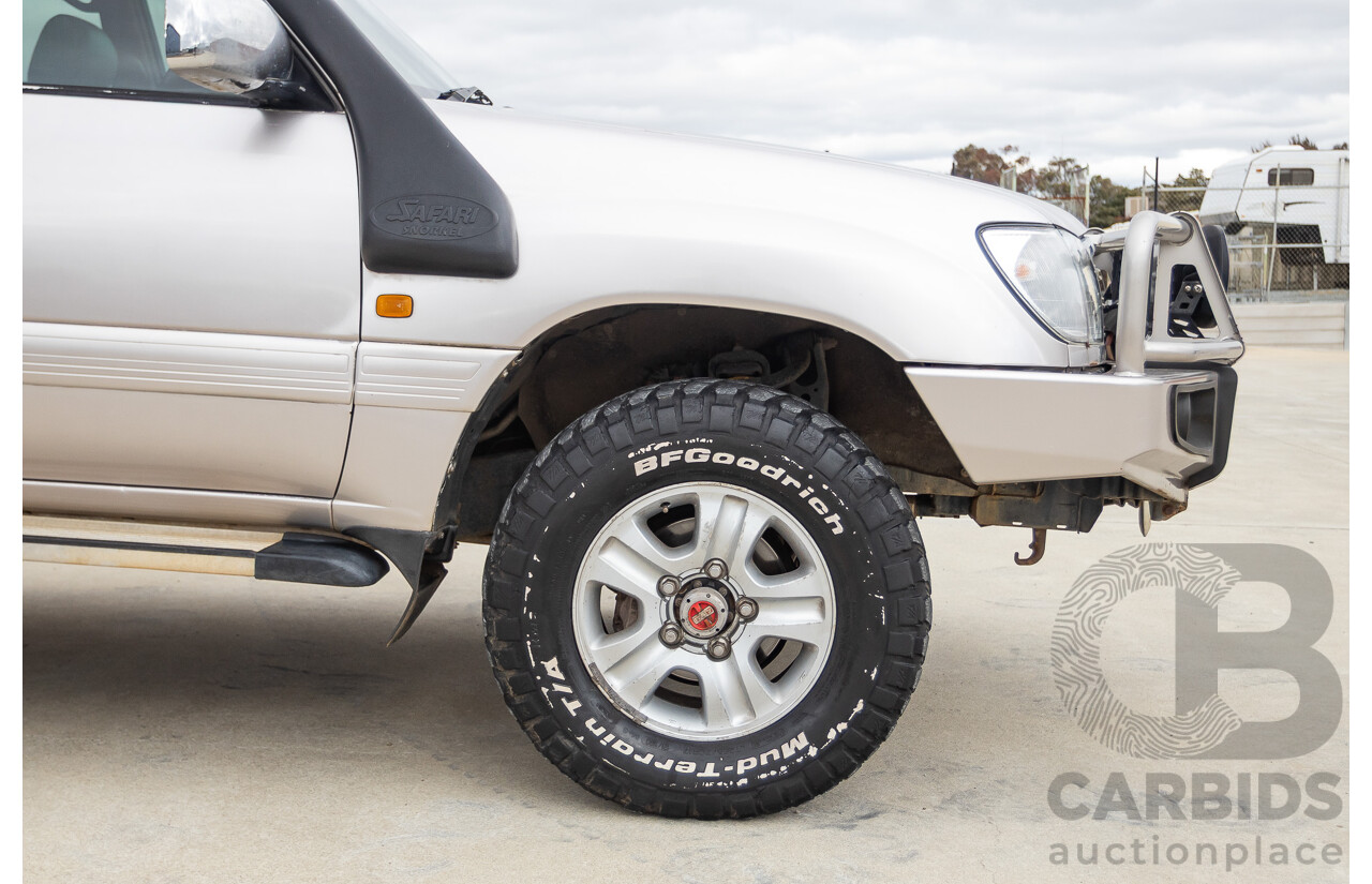 2/2004 Toyota Landcruiser Sahara (4x4) UZJ100R 4d Wagon Warm Silver Metallic V8 4.7L