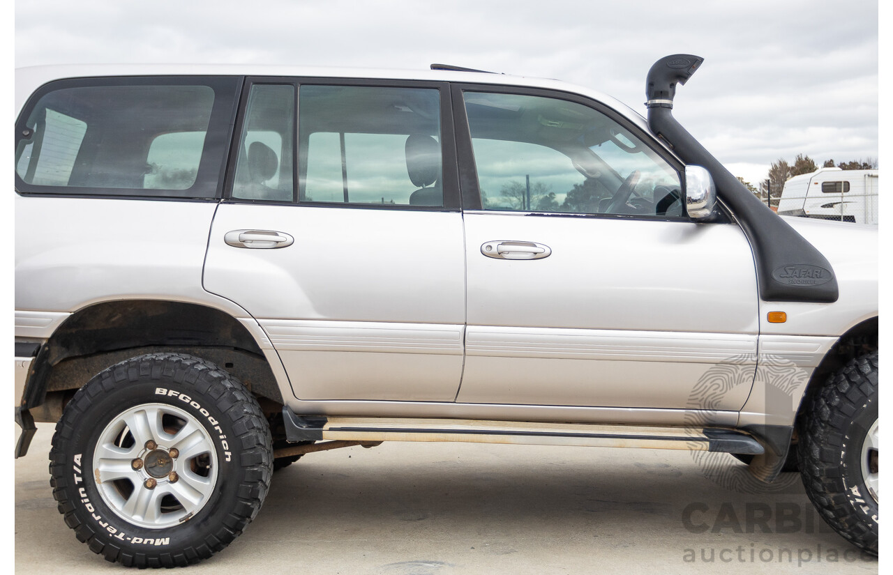 2/2004 Toyota Landcruiser Sahara (4x4) UZJ100R 4d Wagon Warm Silver Metallic V8 4.7L
