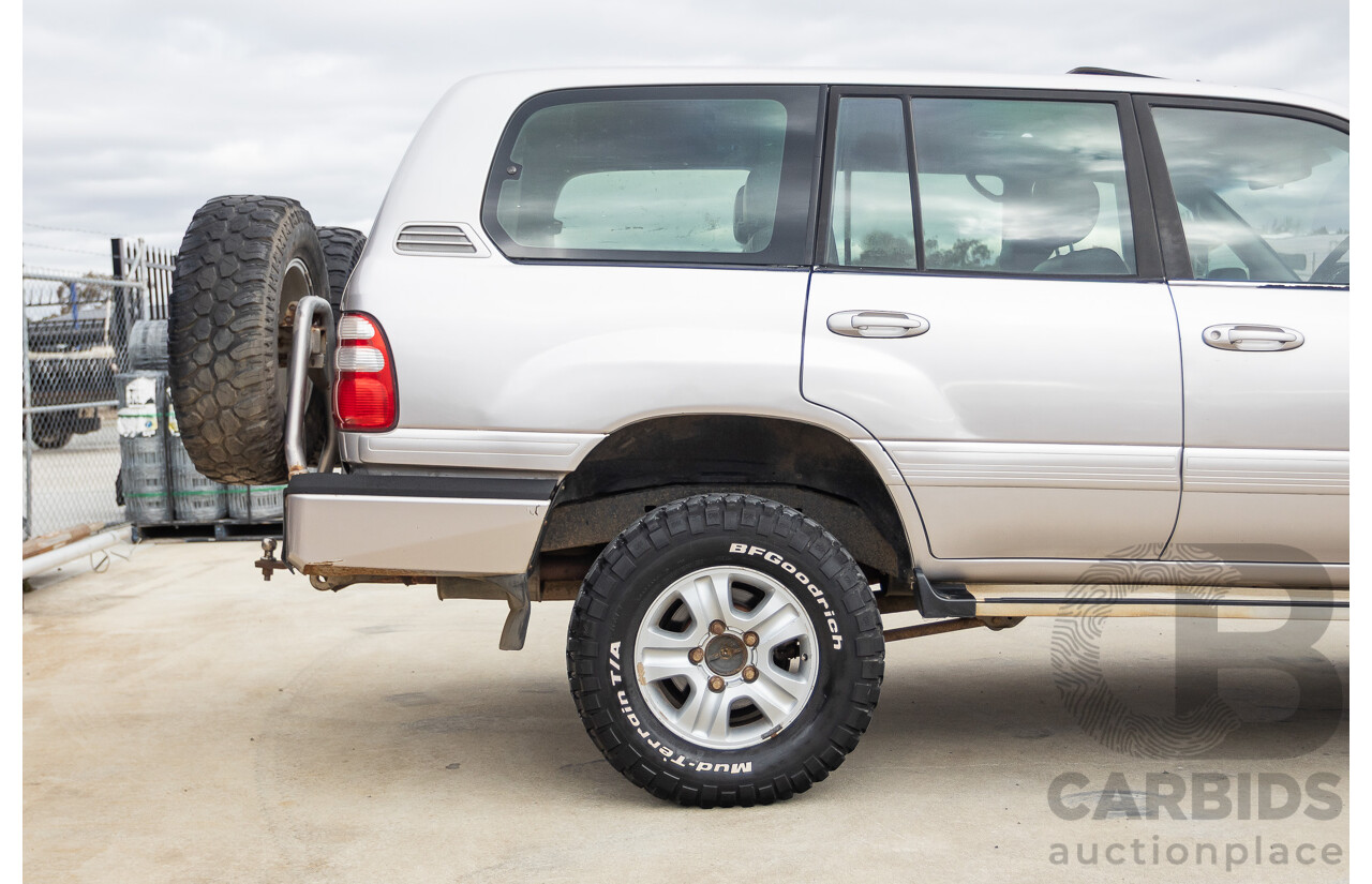2/2004 Toyota Landcruiser Sahara (4x4) UZJ100R 4d Wagon Warm Silver Metallic V8 4.7L