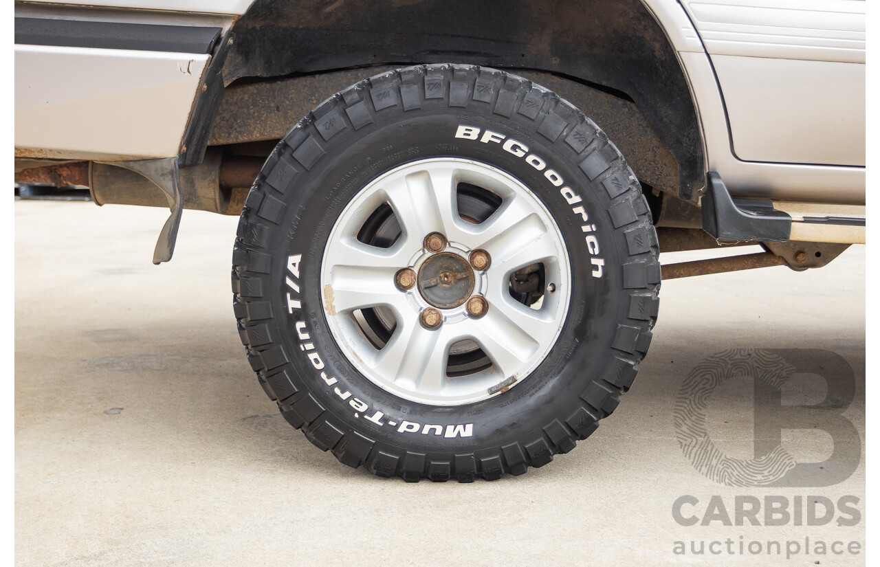 2/2004 Toyota Landcruiser Sahara (4x4) UZJ100R 4d Wagon Warm Silver Metallic V8 4.7L