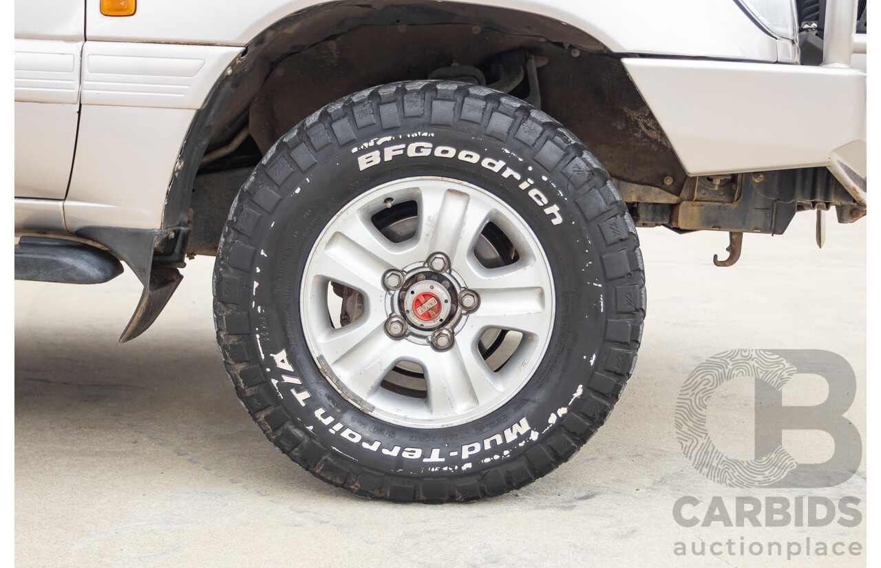 2/2004 Toyota Landcruiser Sahara (4x4) UZJ100R 4d Wagon Warm Silver Metallic V8 4.7L