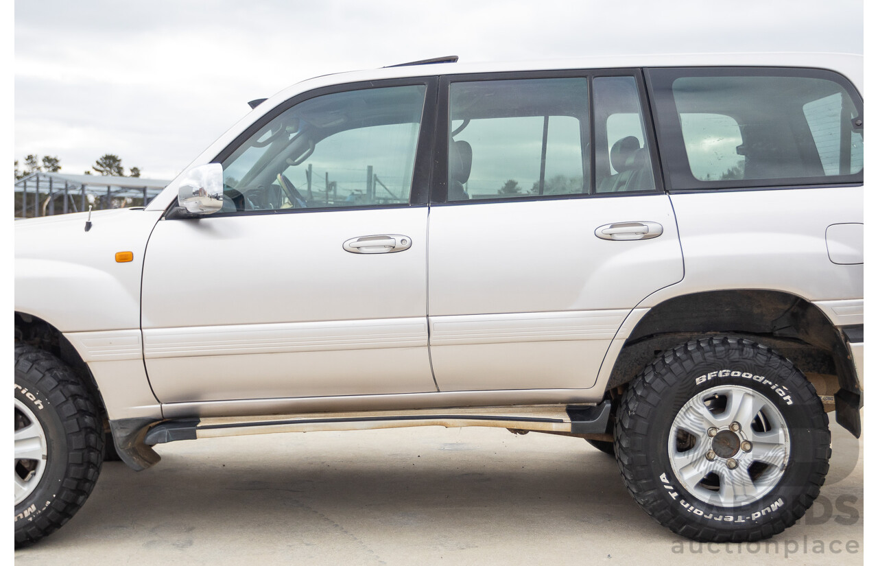 2/2004 Toyota Landcruiser Sahara (4x4) UZJ100R 4d Wagon Warm Silver Metallic V8 4.7L