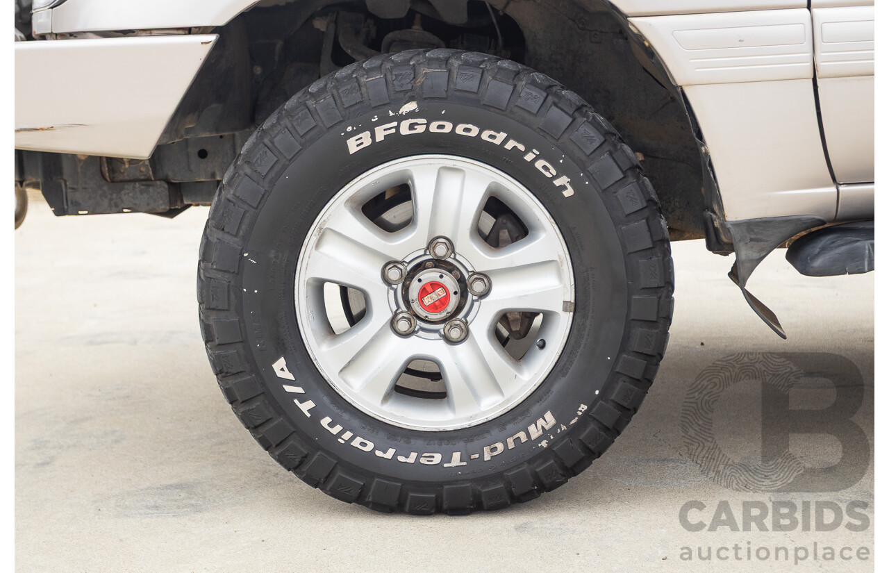 2/2004 Toyota Landcruiser Sahara (4x4) UZJ100R 4d Wagon Warm Silver Metallic V8 4.7L