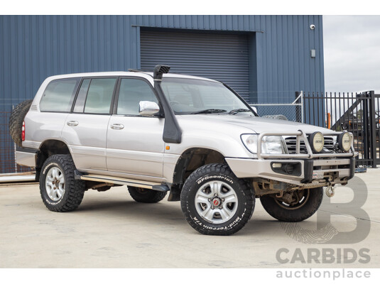 2/2004 Toyota Landcruiser Sahara (4x4) UZJ100R 4d Wagon Warm Silver Metallic V8 4.7L