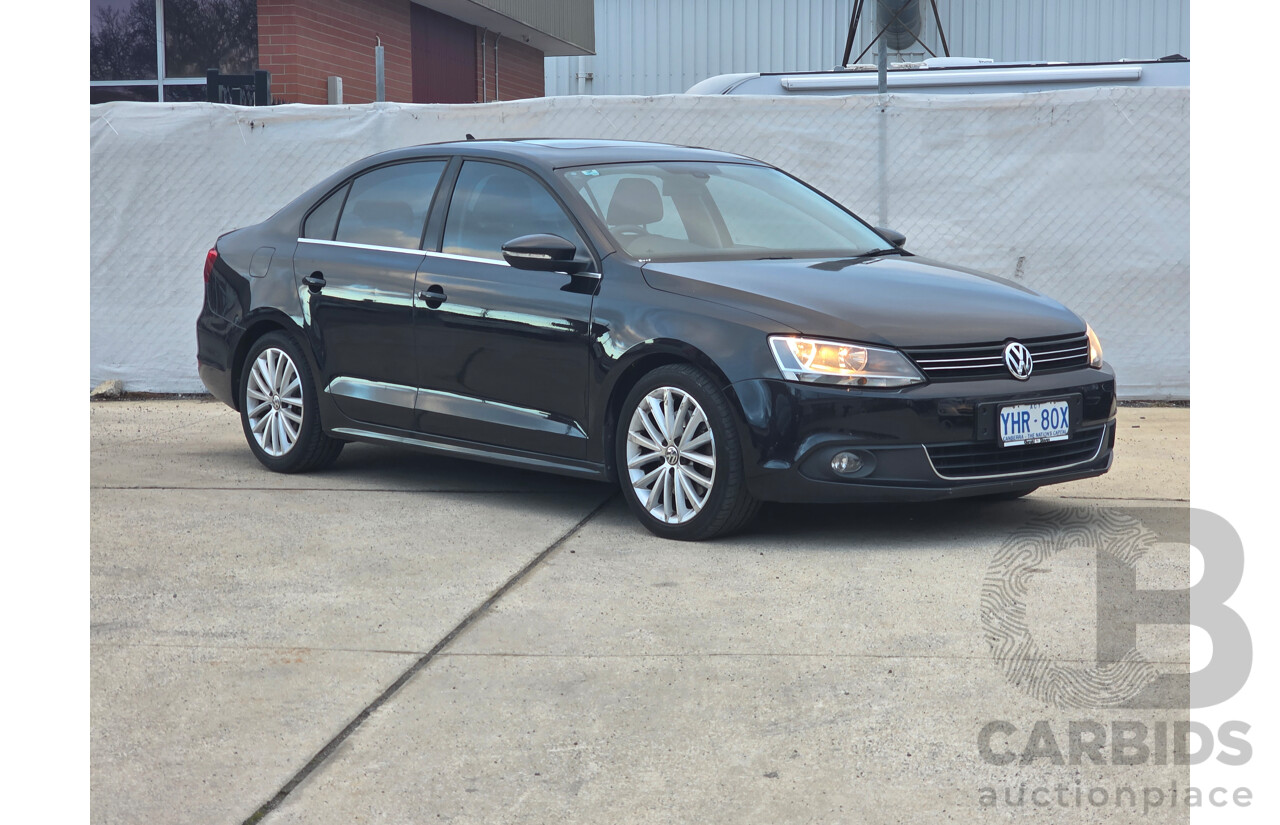 11/2011 Volkswagen Jetta 147 TSI Highline 1KM MY10 4d Sedan Black 2.0L