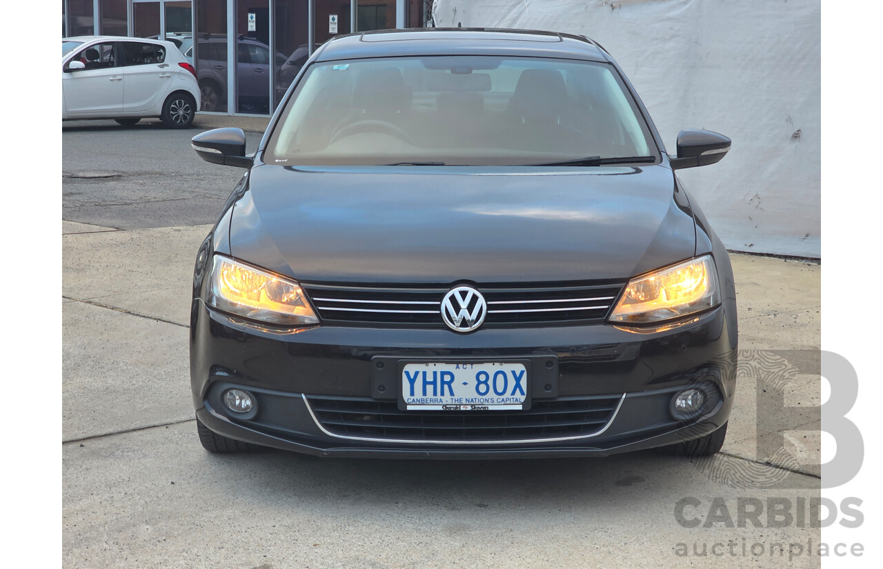 11/2011 Volkswagen Jetta 147 TSI Highline 1KM MY10 4d Sedan Black 2.0L