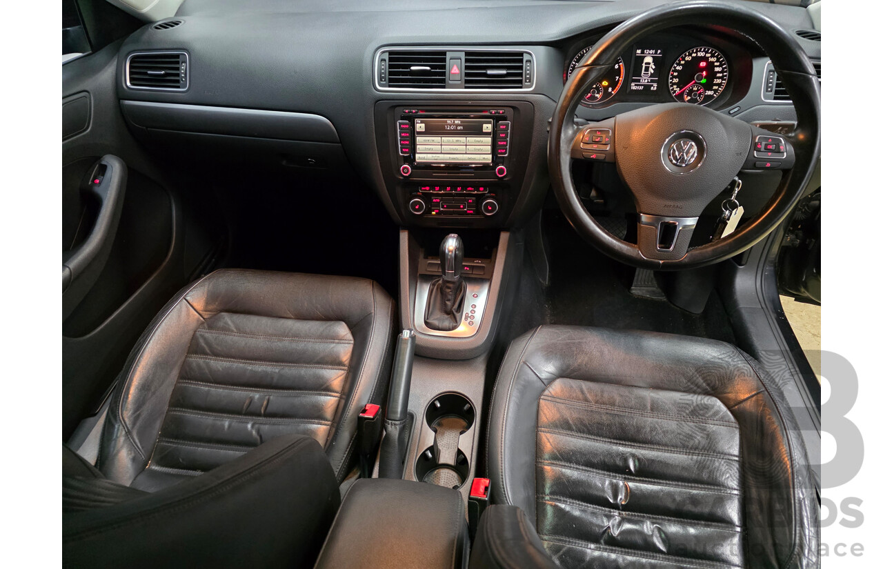 11/2011 Volkswagen Jetta 147 TSI Highline 1KM MY10 4d Sedan Black 2.0L