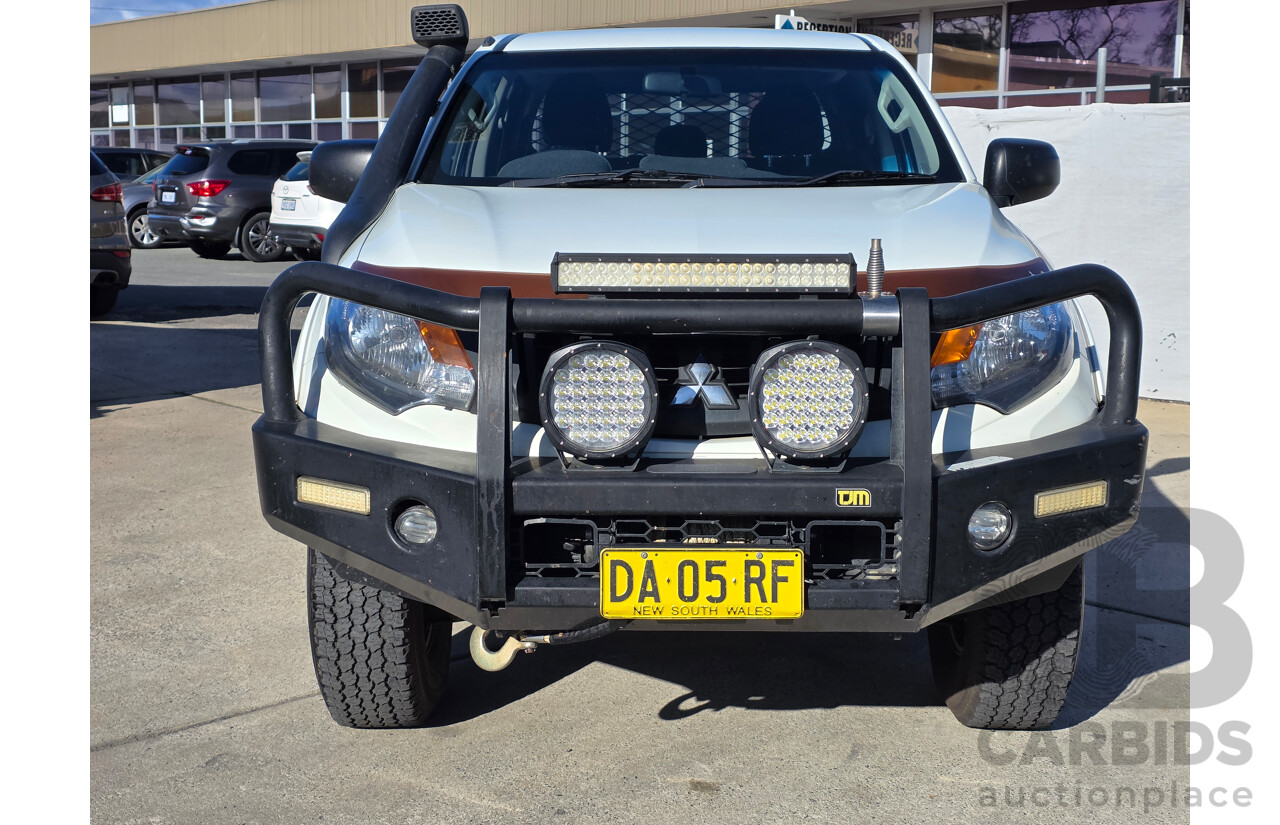 05/2017 Mitsubishi Triton GLX PLUS (4x4) MQ MY17 Dual Cab Utility White Turbo Diesel 2.4L