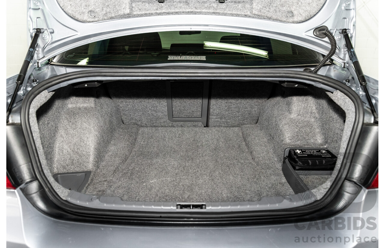 12/2009 BMW 320i Executive E90 MY09 4d Sedan Bluewater Metallic 2.0L