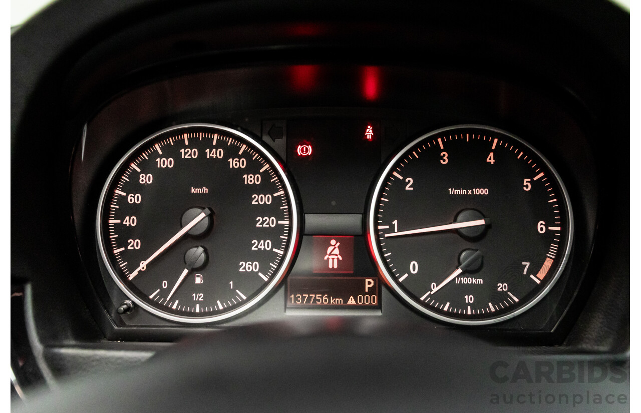 12/2009 BMW 320i Executive E90 MY09 4d Sedan Bluewater Metallic 2.0L
