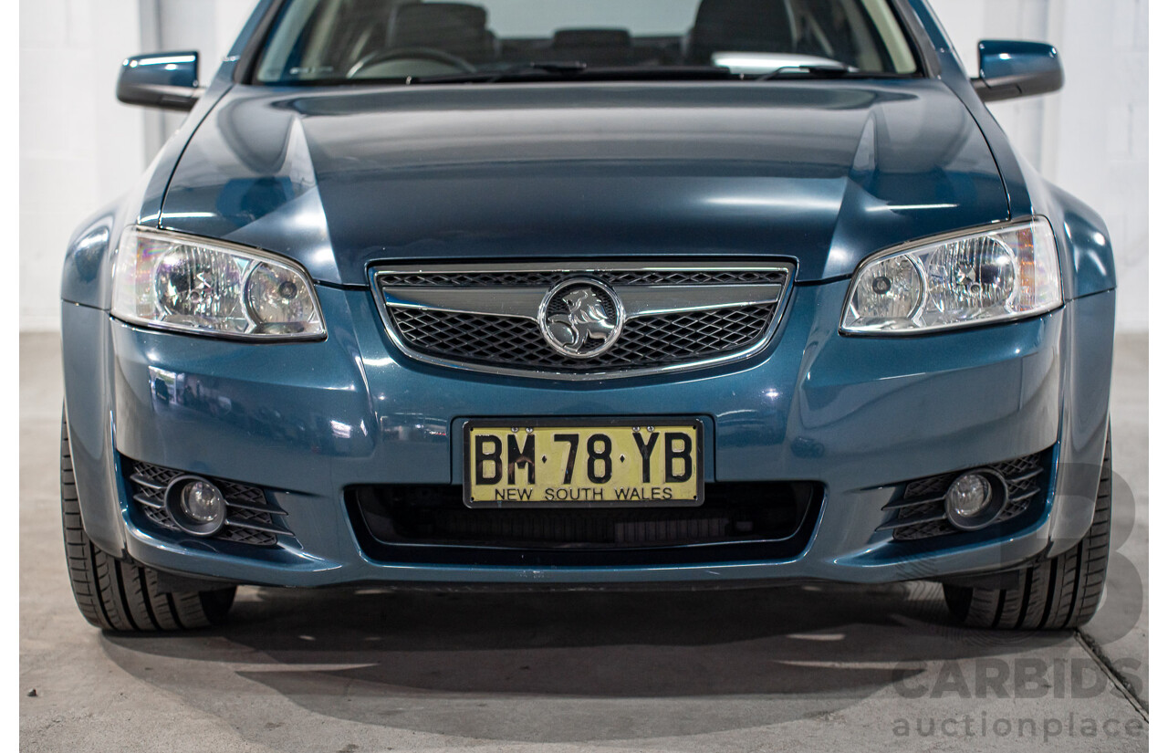 8/2011 Holden Berlina International VE II 4d Sedan Karma Blue V6 3.0L