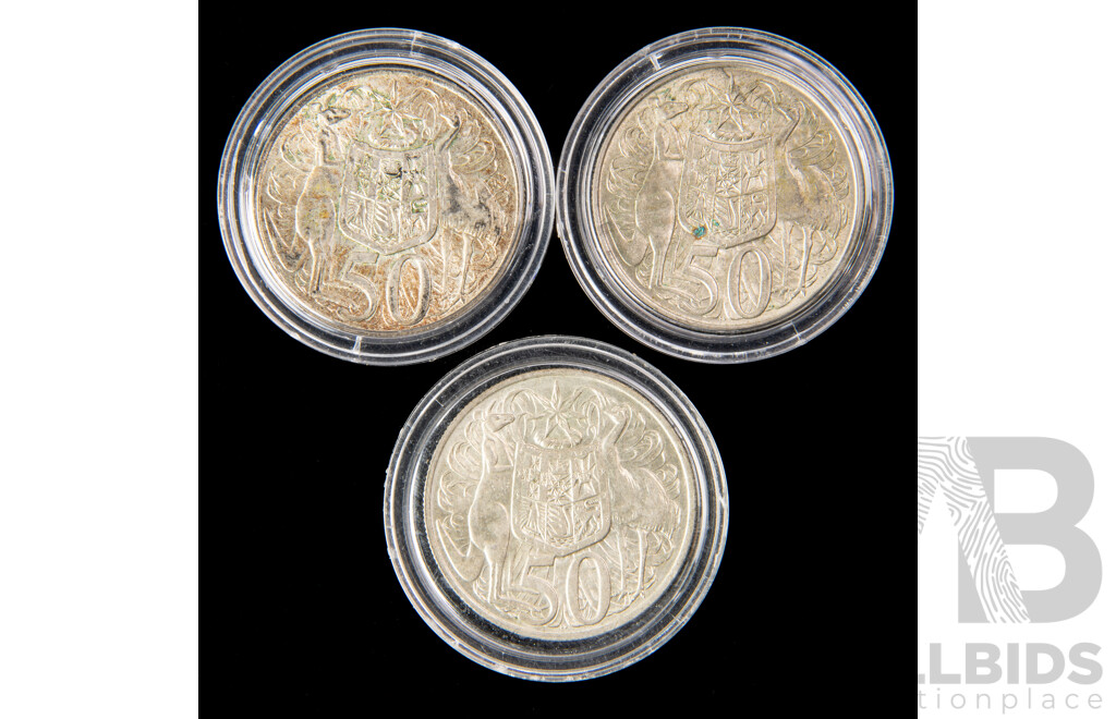 Three Australian 1966 round fifty cent coins