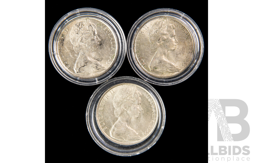 Three Australian 1966 round fifty cent coins