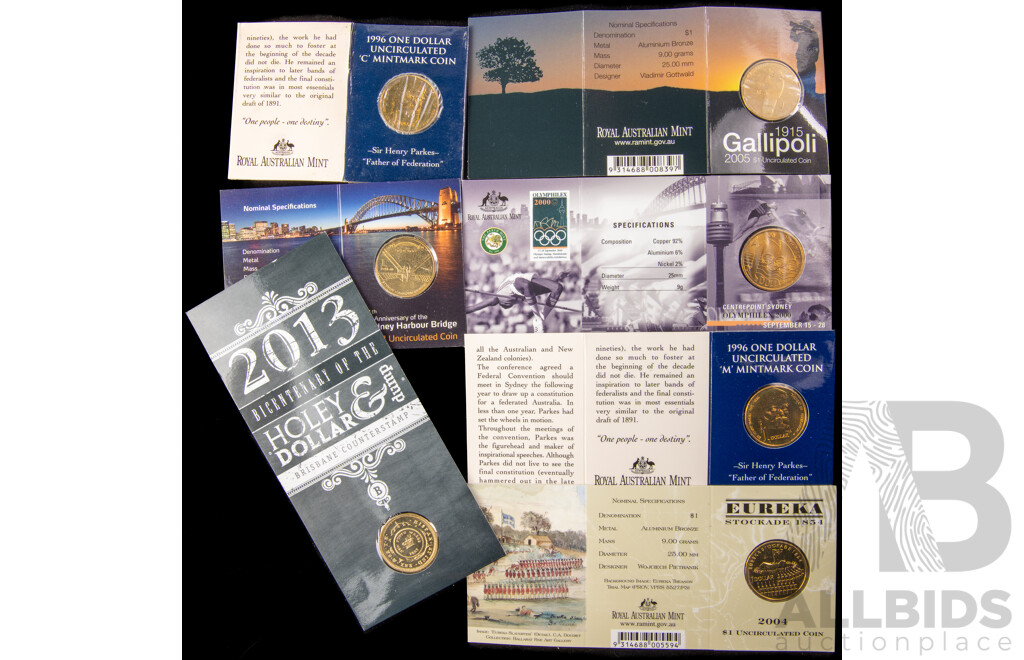 Seven Australian assorted commemorative $1 coins.