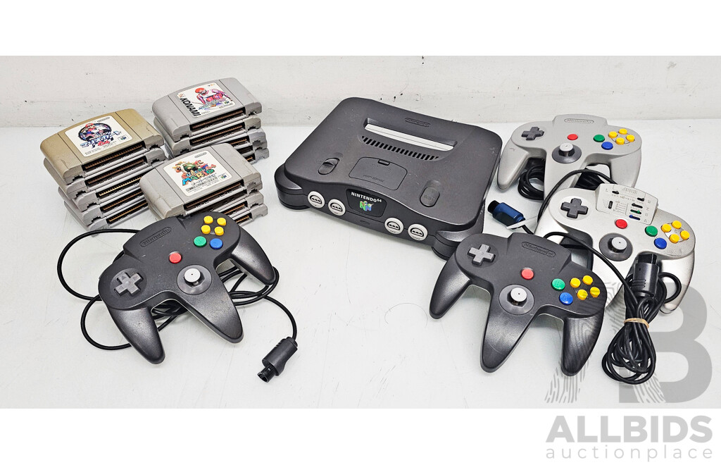 Vintage Nintendo N64 Video Game Console /w Controllers, Games & Cables