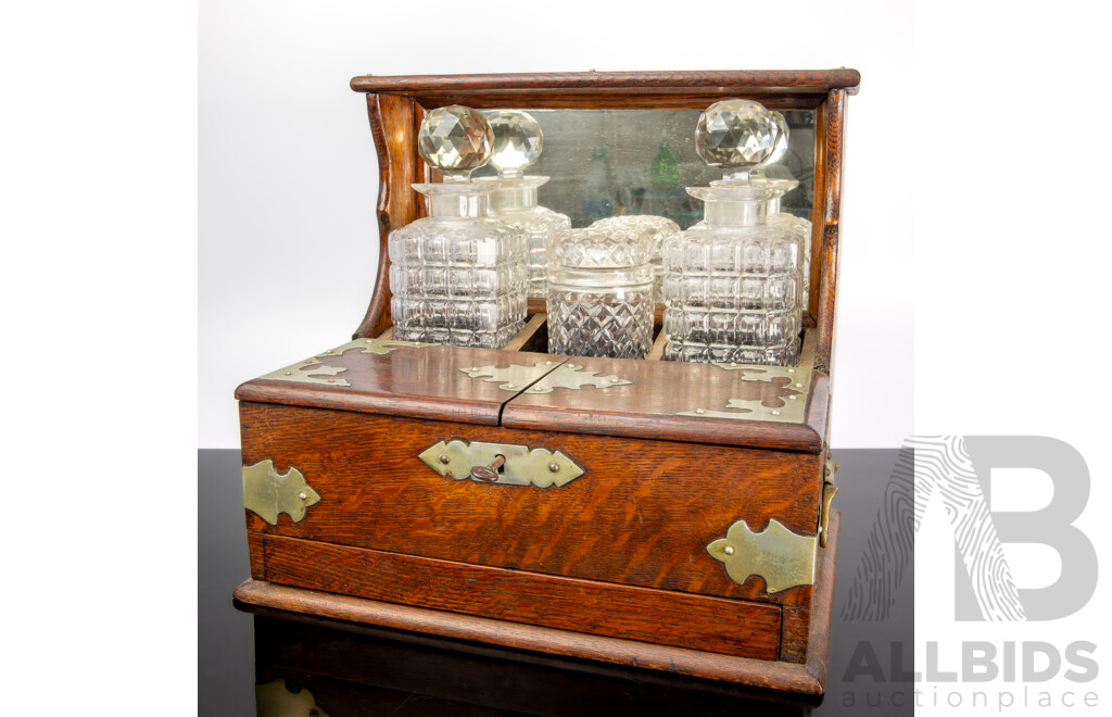 Antique Mahogany Mirror Backed Tantalus with Brass Fittings & Cut Glass Decanters