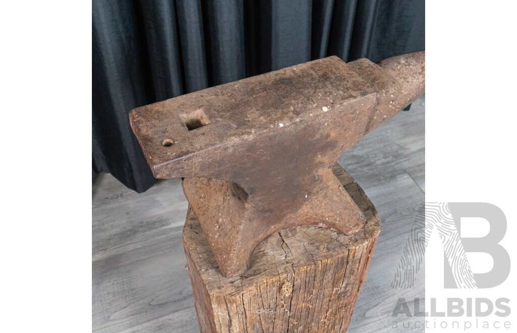 Vintage Cast Iron Anvil on Stump