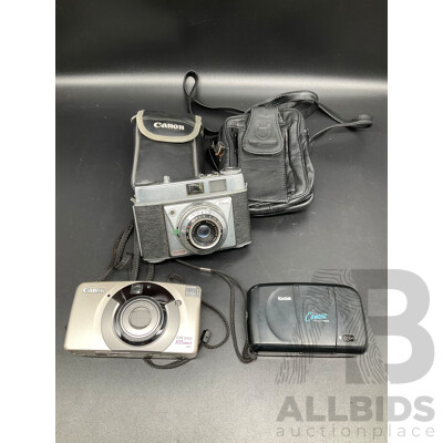 KODAK Retinette Camera, CANON Sure Shot 105zoomS Camera, KODAK Cameo Focus Free Camera and Two Camera Cases - Lot of 5