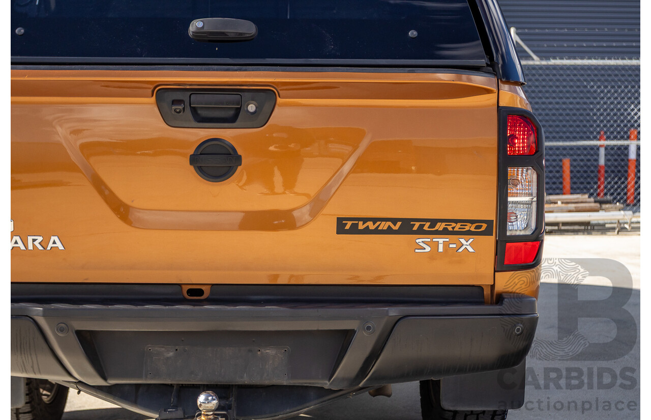 1/2015 Nissan Navara ST-X NP300 D23 4d Dual Cab Utility Hornet Gold Metallic Twin Turbo Diesel 2.3L