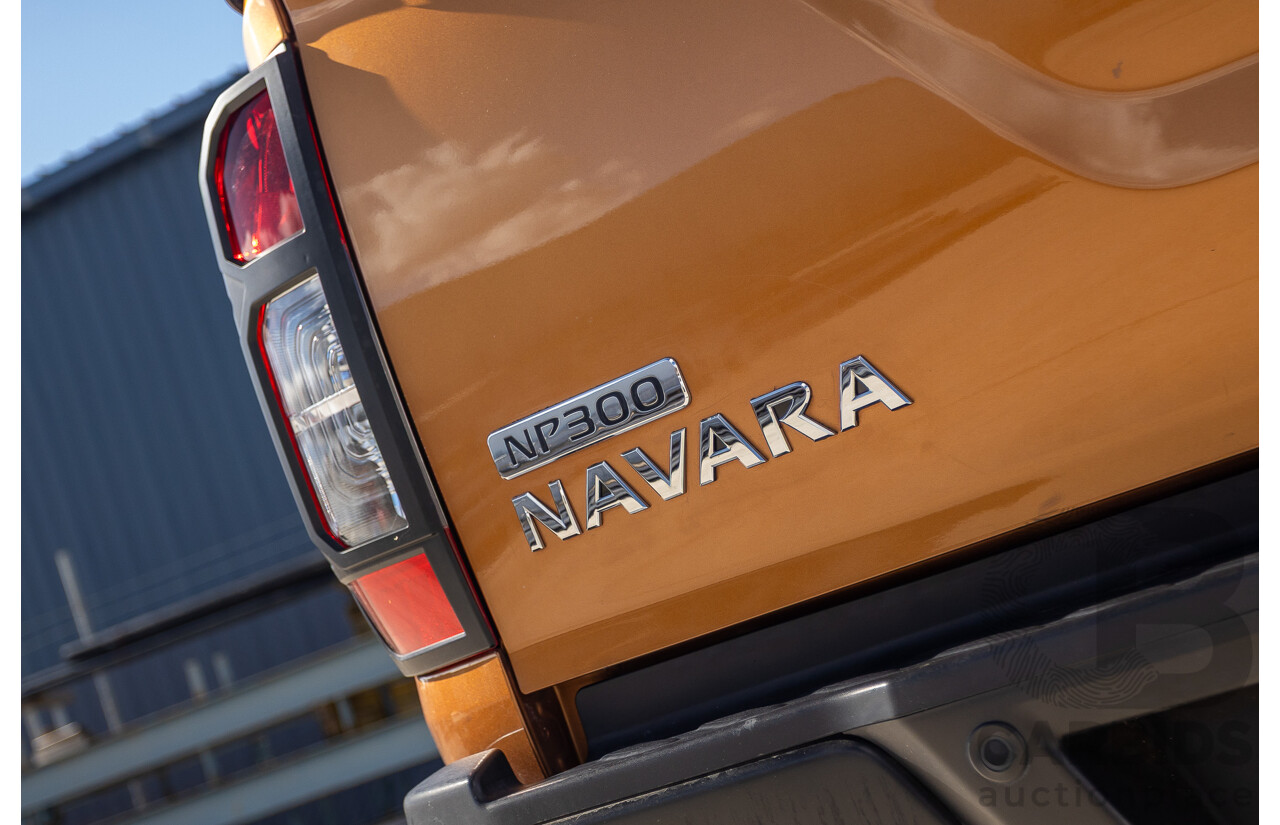 1/2015 Nissan Navara ST-X NP300 D23 4d Dual Cab Utility Hornet Gold Metallic Twin Turbo Diesel 2.3L