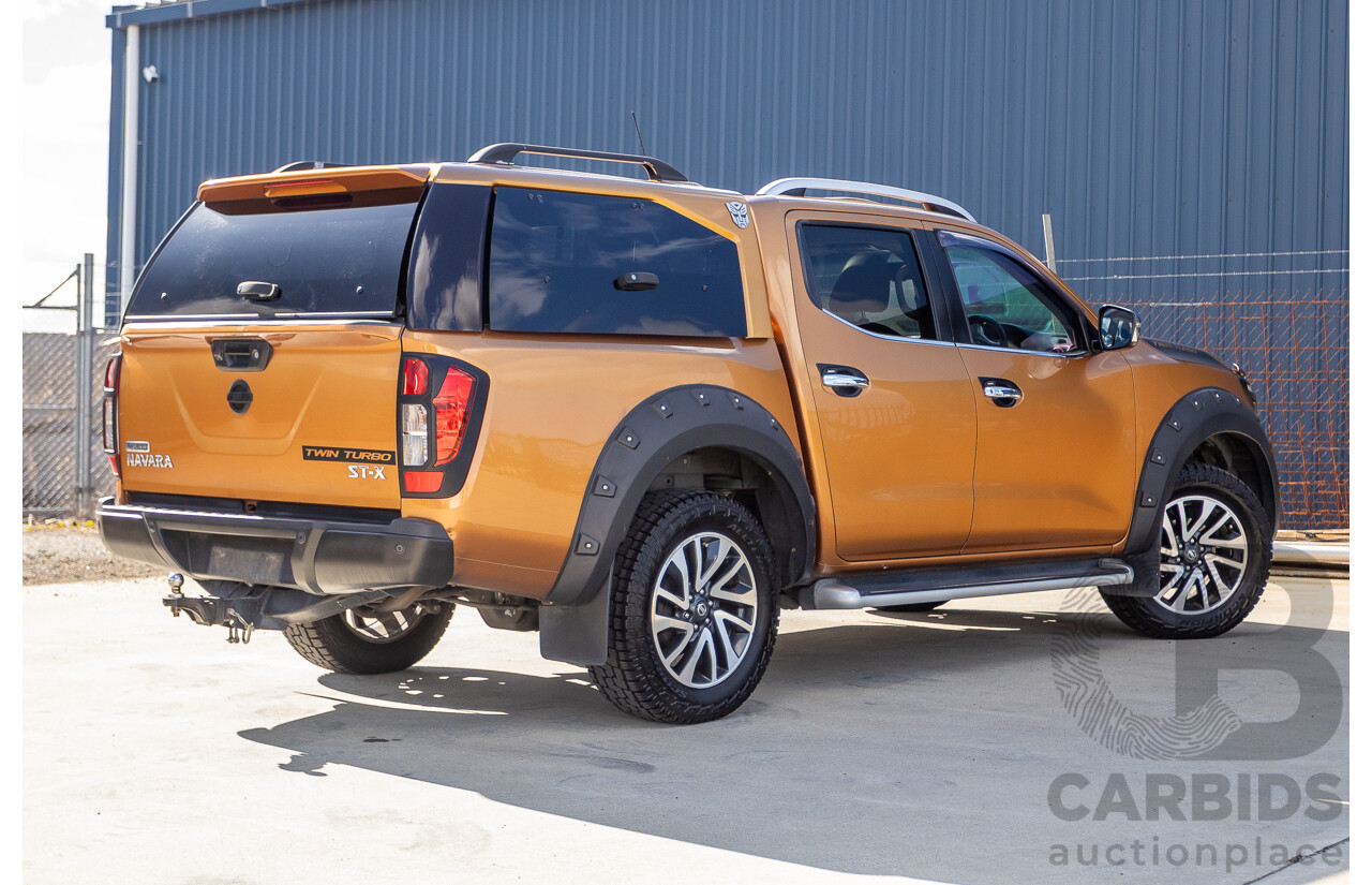 1/2015 Nissan Navara ST-X NP300 D23 4d Dual Cab Utility Hornet Gold Metallic Twin Turbo Diesel 2.3L