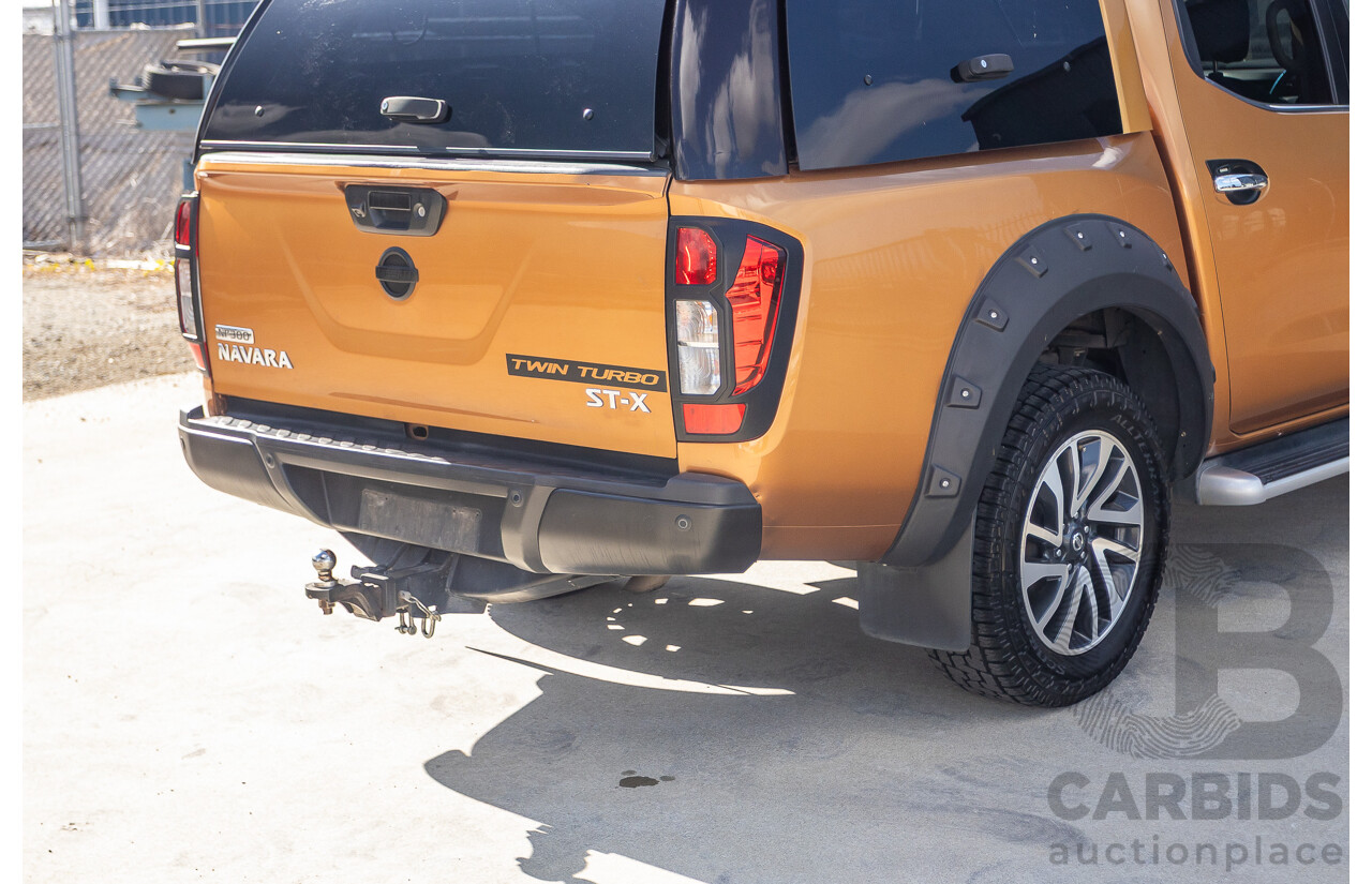 1/2015 Nissan Navara ST-X NP300 D23 4d Dual Cab Utility Hornet Gold Metallic Twin Turbo Diesel 2.3L