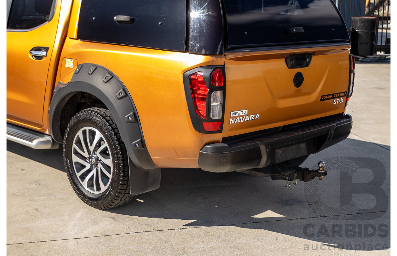 1/2015 Nissan Navara ST-X NP300 D23 4d Dual Cab Utility Hornet Gold Metallic Twin Turbo Diesel 2.3L