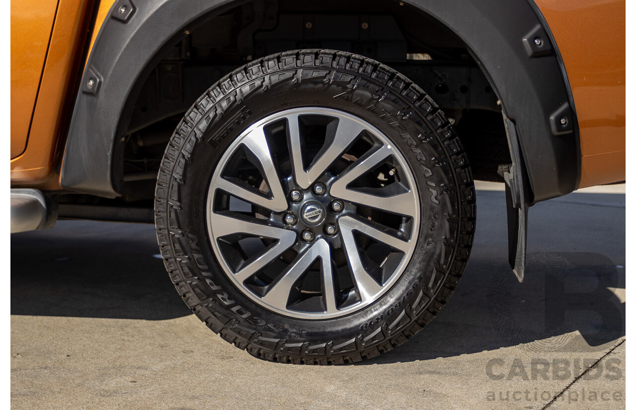 1/2015 Nissan Navara ST-X NP300 D23 4d Dual Cab Utility Hornet Gold Metallic Twin Turbo Diesel 2.3L