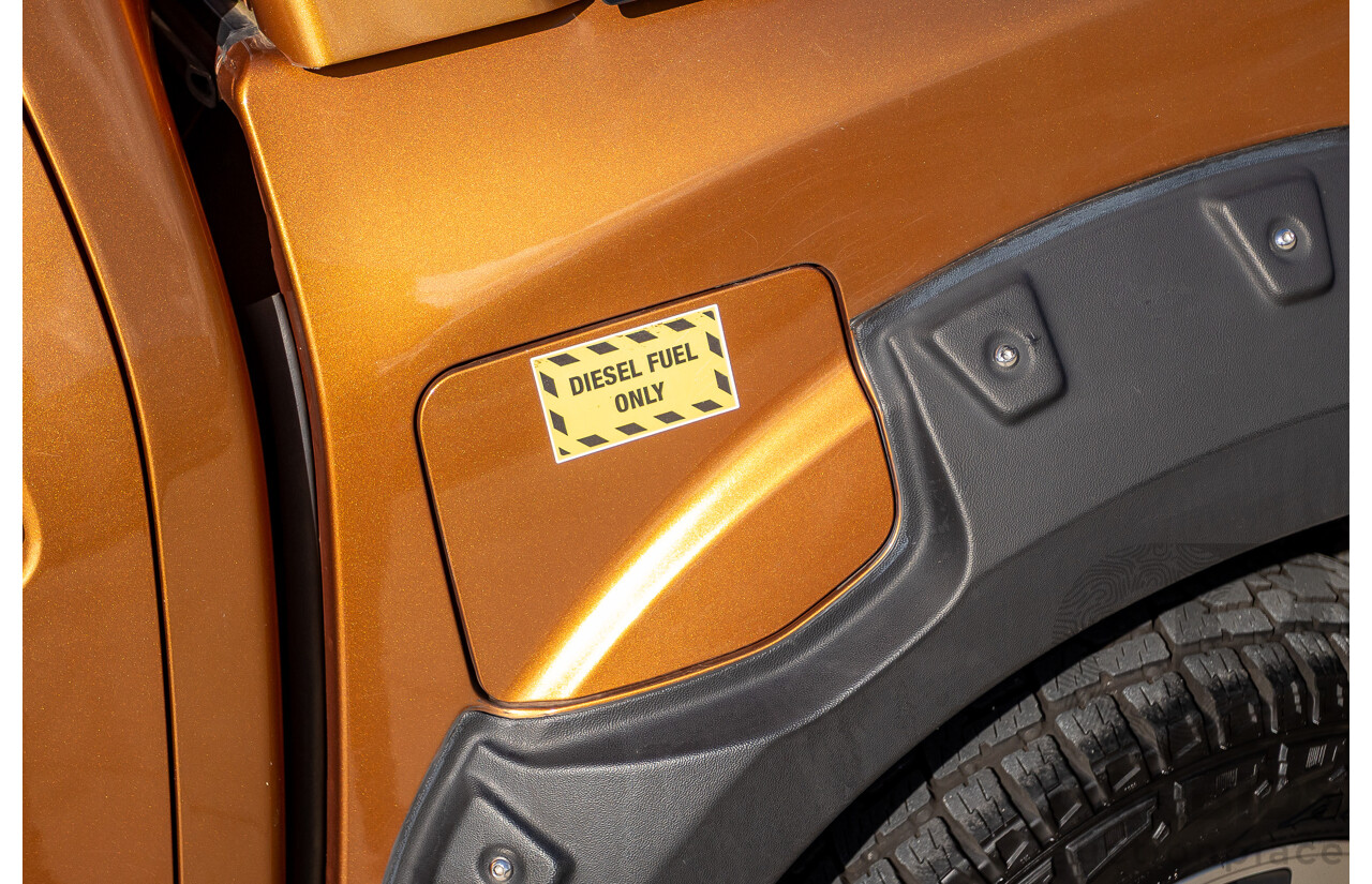 1/2015 Nissan Navara ST-X NP300 D23 4d Dual Cab Utility Hornet Gold Metallic Twin Turbo Diesel 2.3L