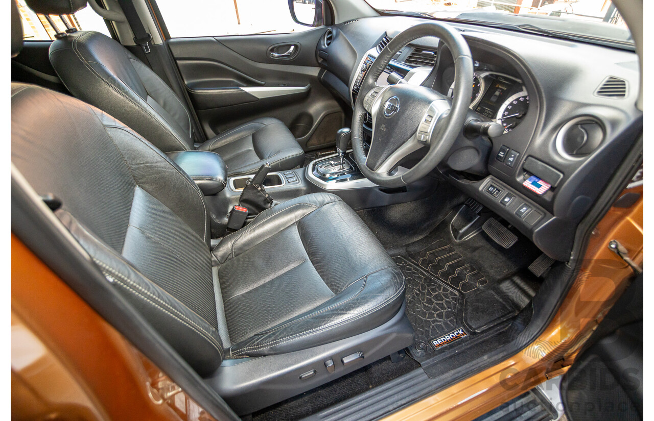 1/2015 Nissan Navara ST-X NP300 D23 4d Dual Cab Utility Hornet Gold Metallic Twin Turbo Diesel 2.3L
