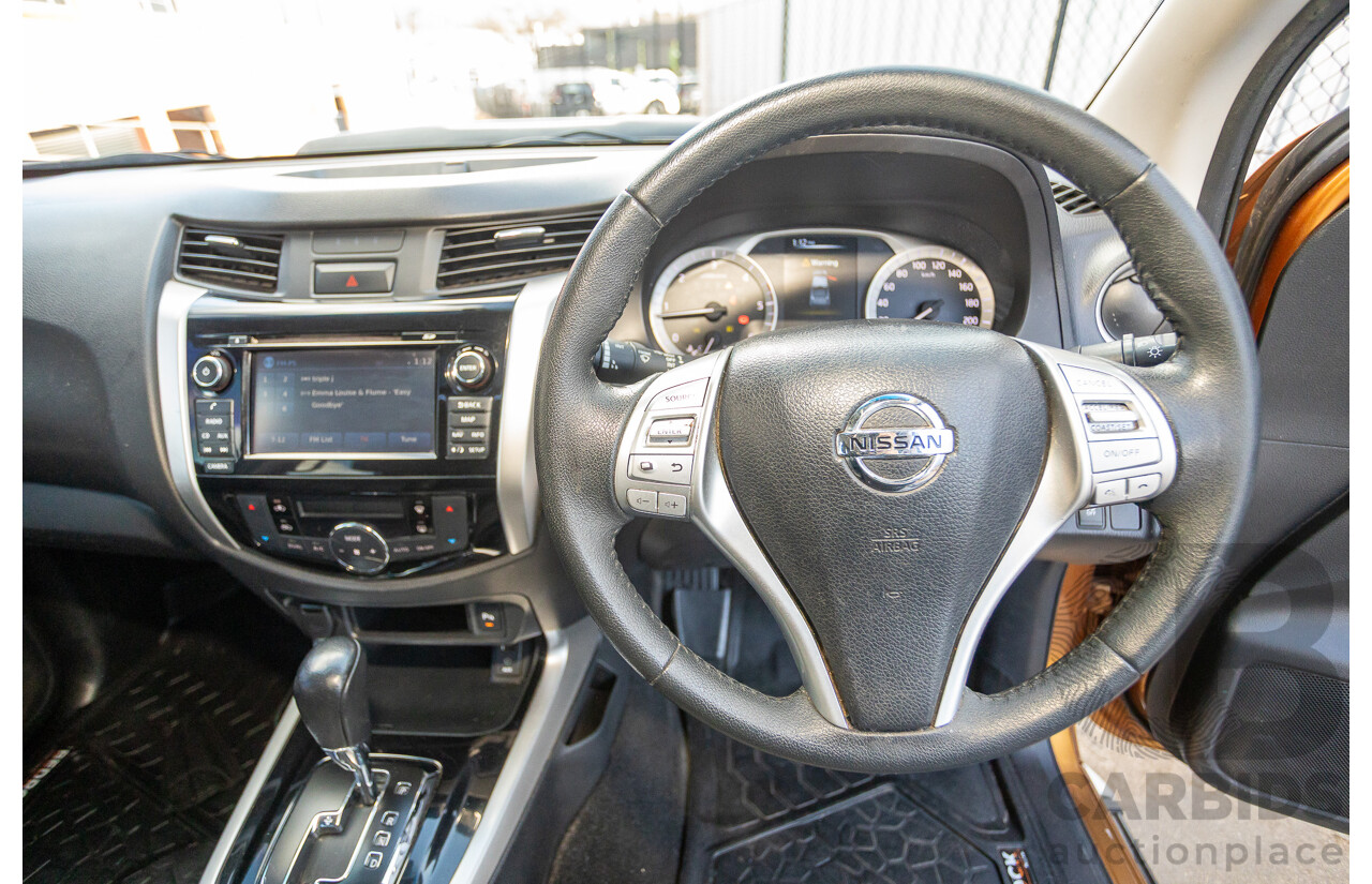 1/2015 Nissan Navara ST-X NP300 D23 4d Dual Cab Utility Hornet Gold Metallic Twin Turbo Diesel 2.3L