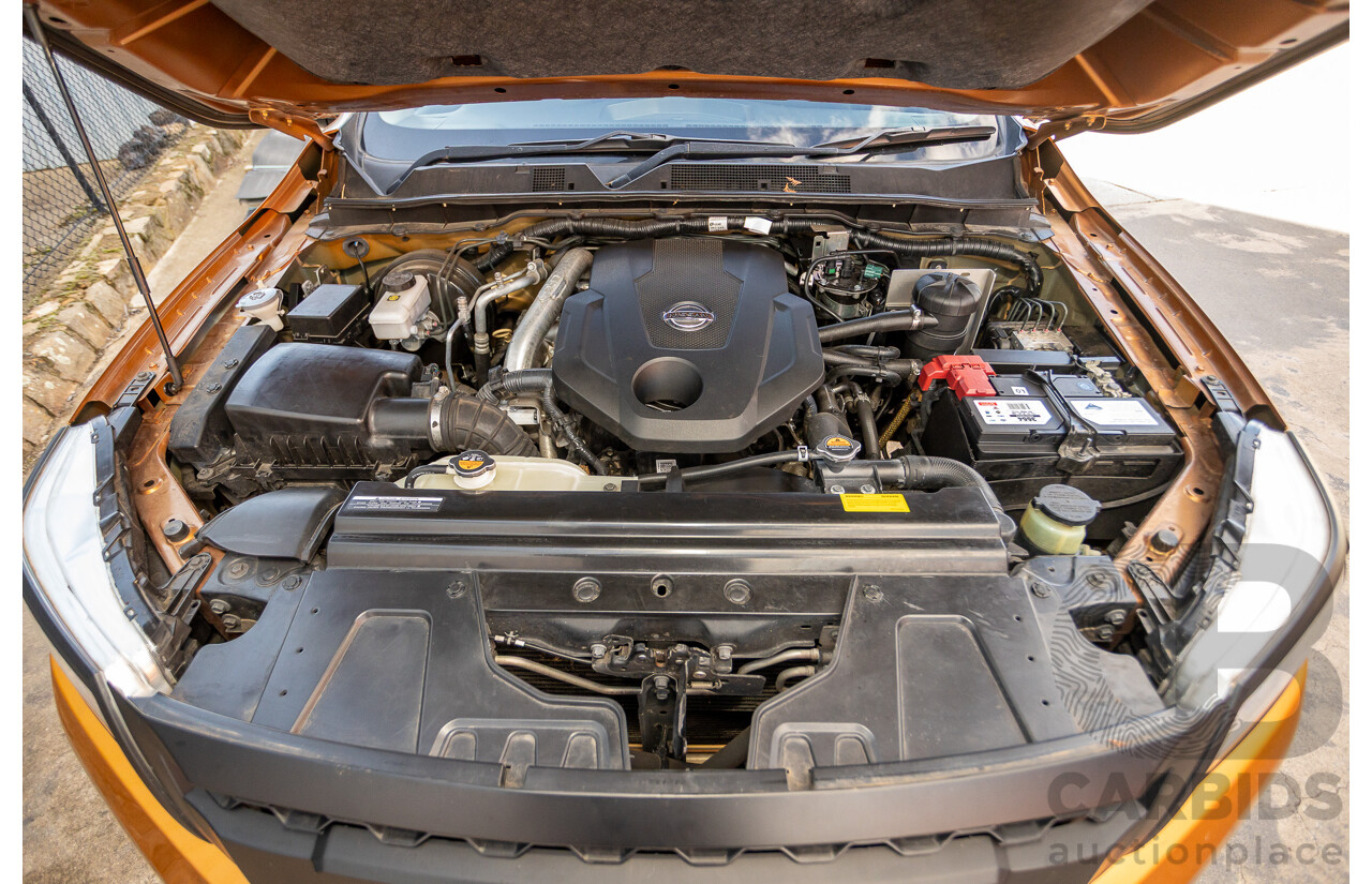 1/2015 Nissan Navara ST-X NP300 D23 4d Dual Cab Utility Hornet Gold Metallic Twin Turbo Diesel 2.3L