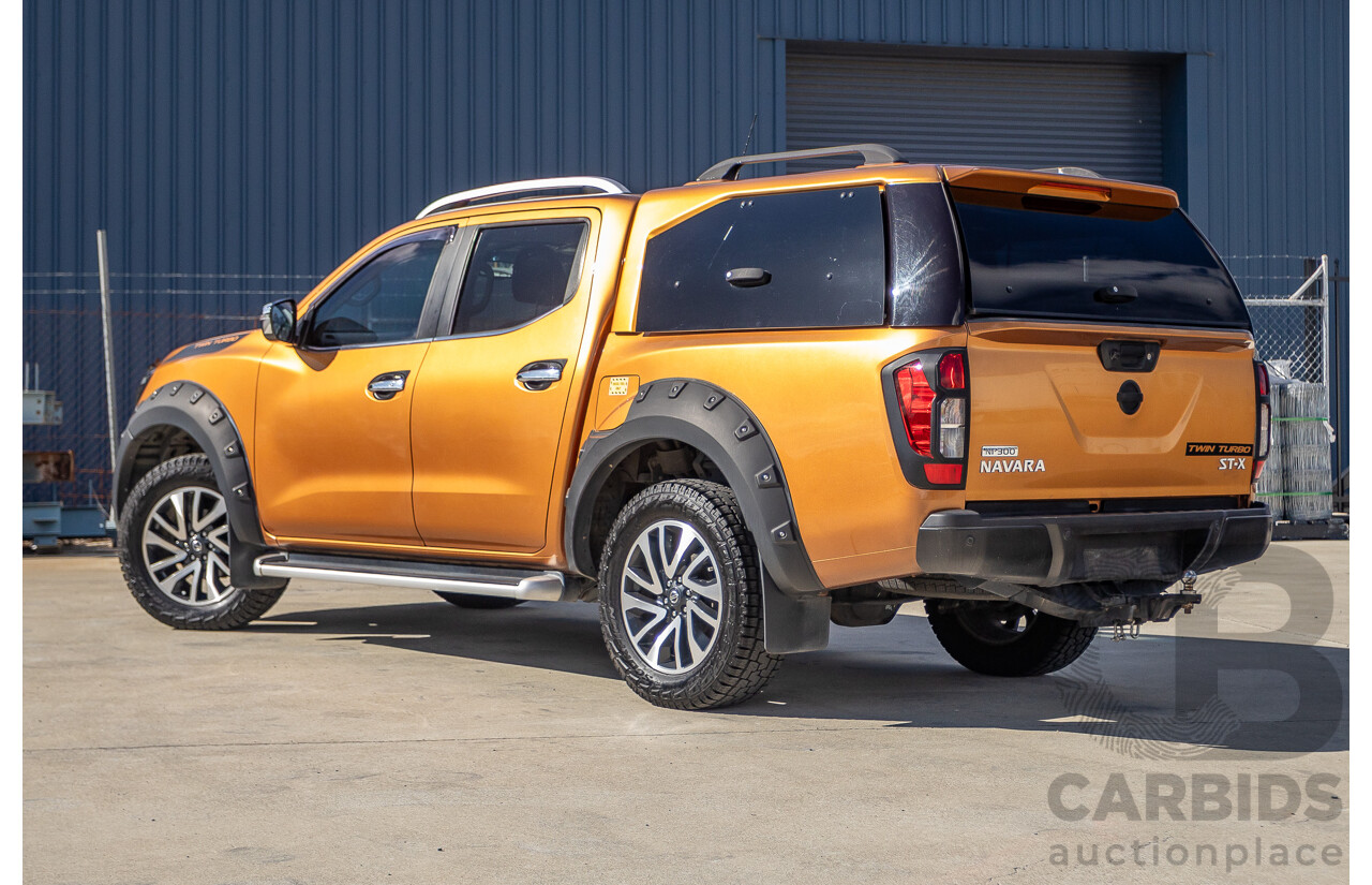 1/2015 Nissan Navara ST-X NP300 D23 4d Dual Cab Utility Hornet Gold Metallic Twin Turbo Diesel 2.3L