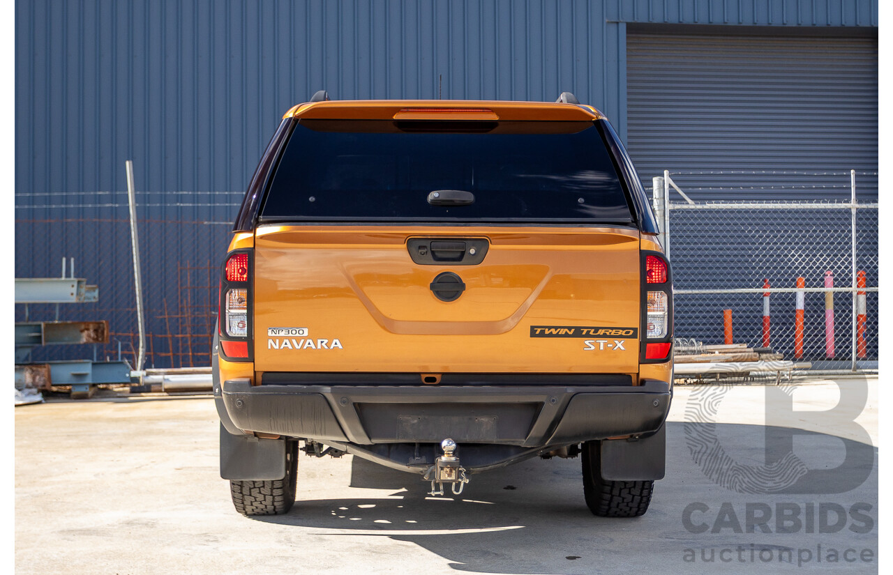 1/2015 Nissan Navara ST-X NP300 D23 4d Dual Cab Utility Hornet Gold Metallic Twin Turbo Diesel 2.3L