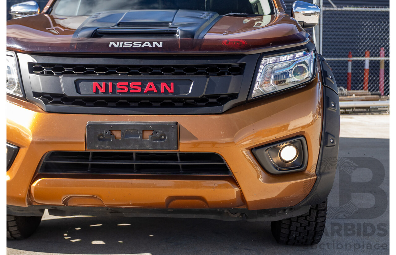 1/2015 Nissan Navara ST-X NP300 D23 4d Dual Cab Utility Hornet Gold Metallic Twin Turbo Diesel 2.3L
