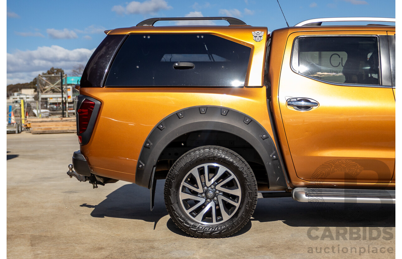 1/2015 Nissan Navara ST-X NP300 D23 4d Dual Cab Utility Hornet Gold Metallic Twin Turbo Diesel 2.3L