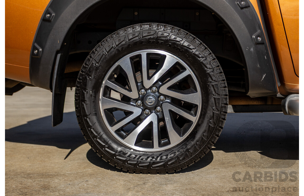 1/2015 Nissan Navara ST-X NP300 D23 4d Dual Cab Utility Hornet Gold Metallic Twin Turbo Diesel 2.3L