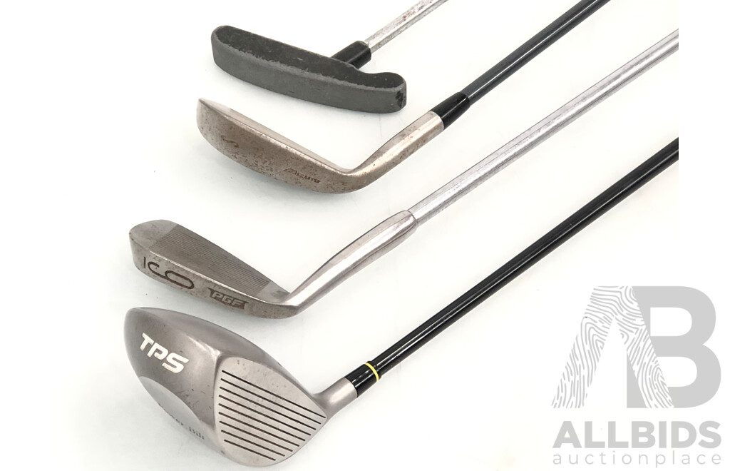 Set of Four Golf Clubs and Wilson Golf Bag