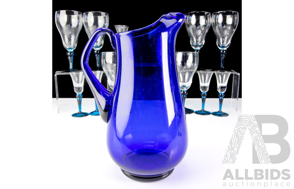 Collection Mid Century Glass Wear Comprising Cobalt Blue Pitcher, Set Seven Wine Glasses with Blue Stems, Matching Set Seven Liquor Glasses