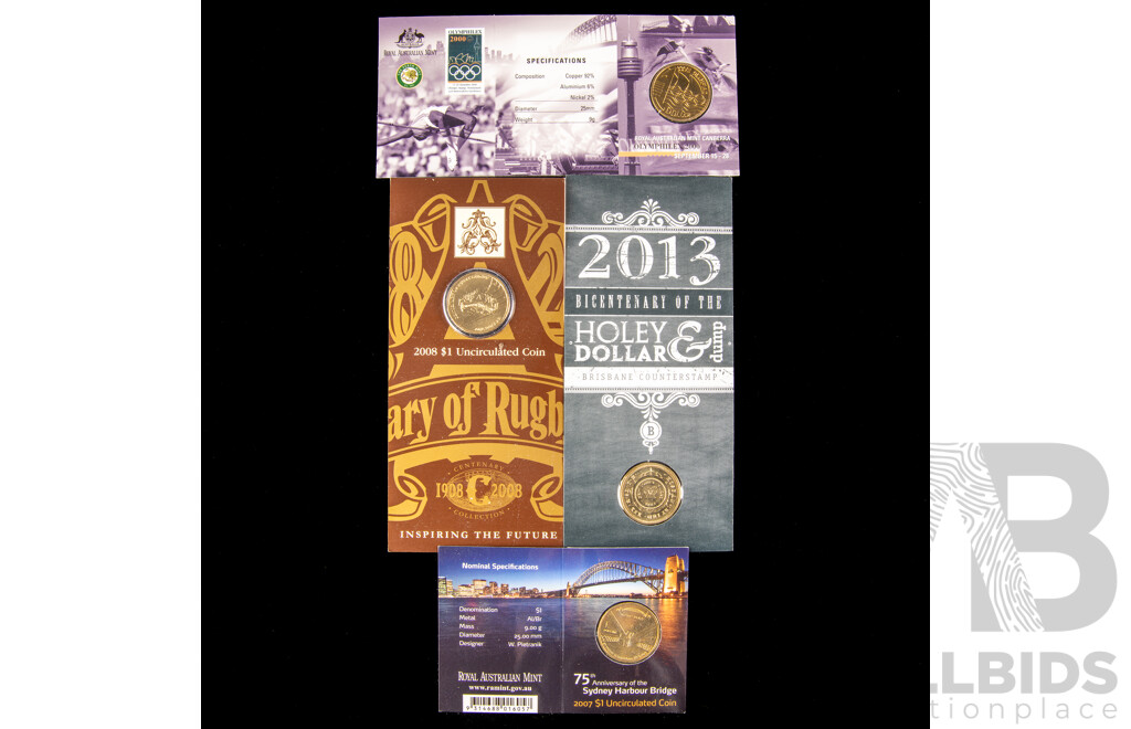 Four Australian UNC assorted one dollar coins