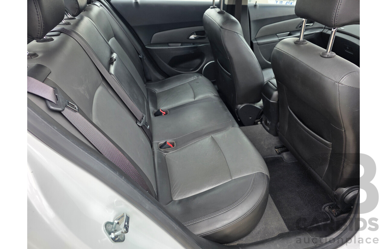 10/2010 Holden Cruze CDX JG 4d Sedan White 1.8L