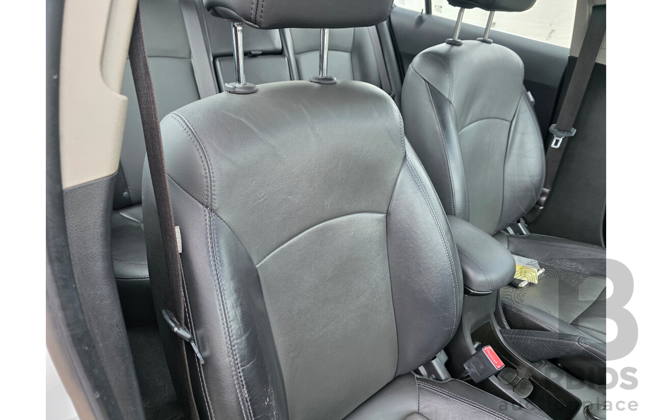 10/2010 Holden Cruze CDX JG 4d Sedan White 1.8L