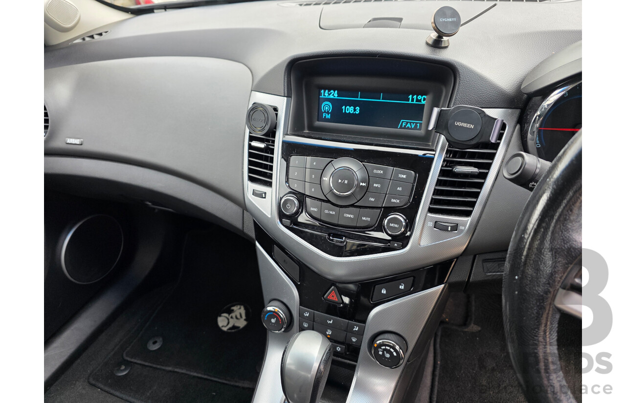 10/2010 Holden Cruze CDX JG 4d Sedan White 1.8L