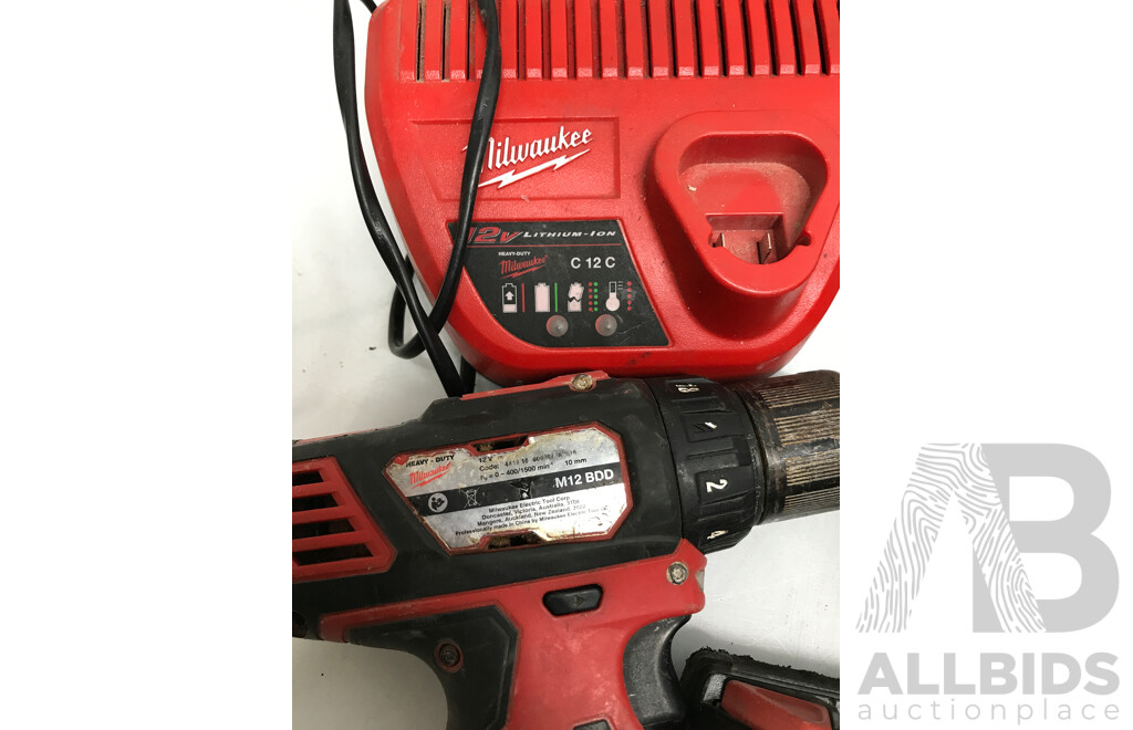 Assorted Milwaukee and Makita Cordless Tools with Batteries