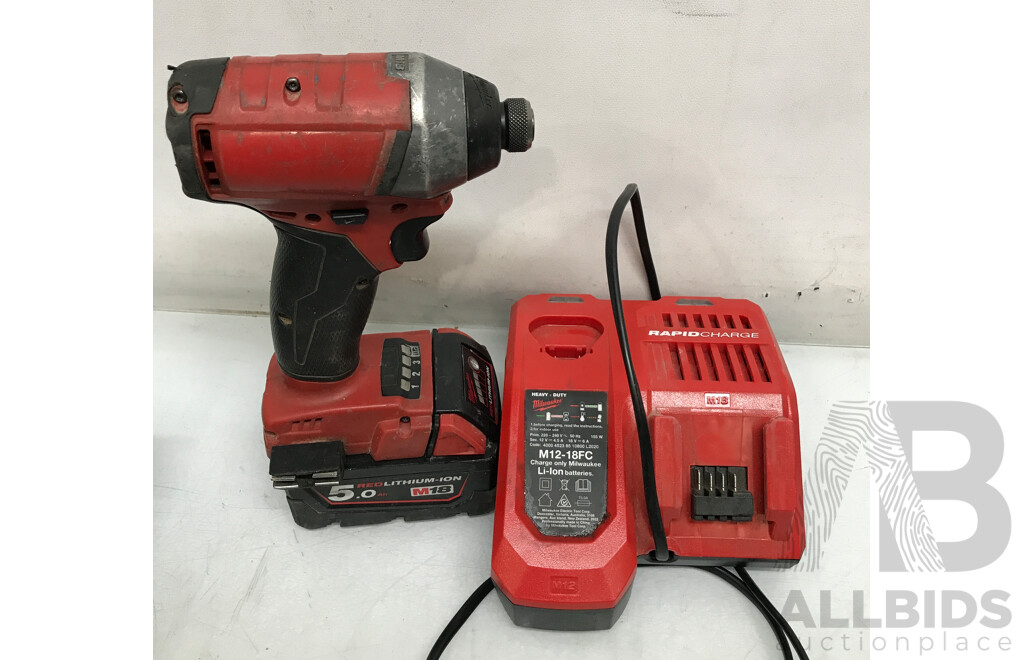 Assorted Milwaukee and Makita Cordless Tools with Batteries