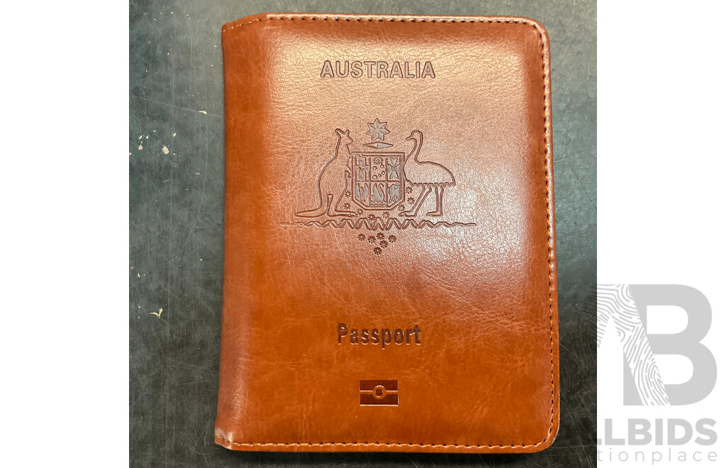 Mixed Lot Includes Passport Wallet, Soy Sauce Dispenser, Nose Hair Remover, Mini Flashlight, and Assorted Baking Items and More.