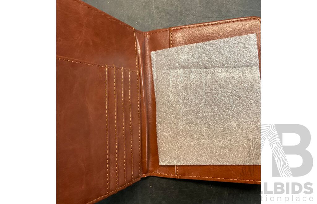 Mixed Lot Includes Passport Wallet, Soy Sauce Dispenser, Nose Hair Remover, Mini Flashlight, and Assorted Baking Items and More.