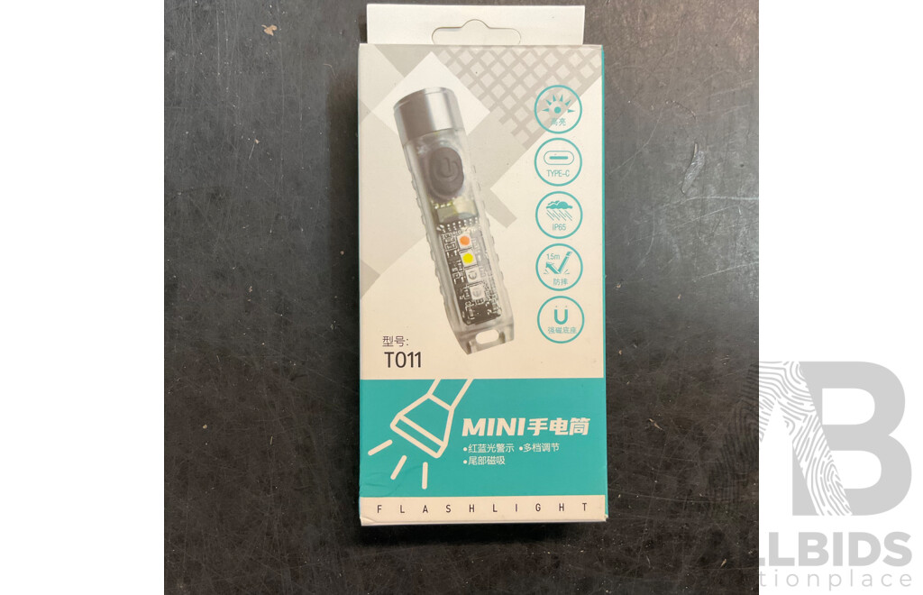 Mixed Lot Includes Passport Wallet, Soy Sauce Dispenser, Nose Hair Remover, Mini Flashlight, and Assorted Baking Items and More.