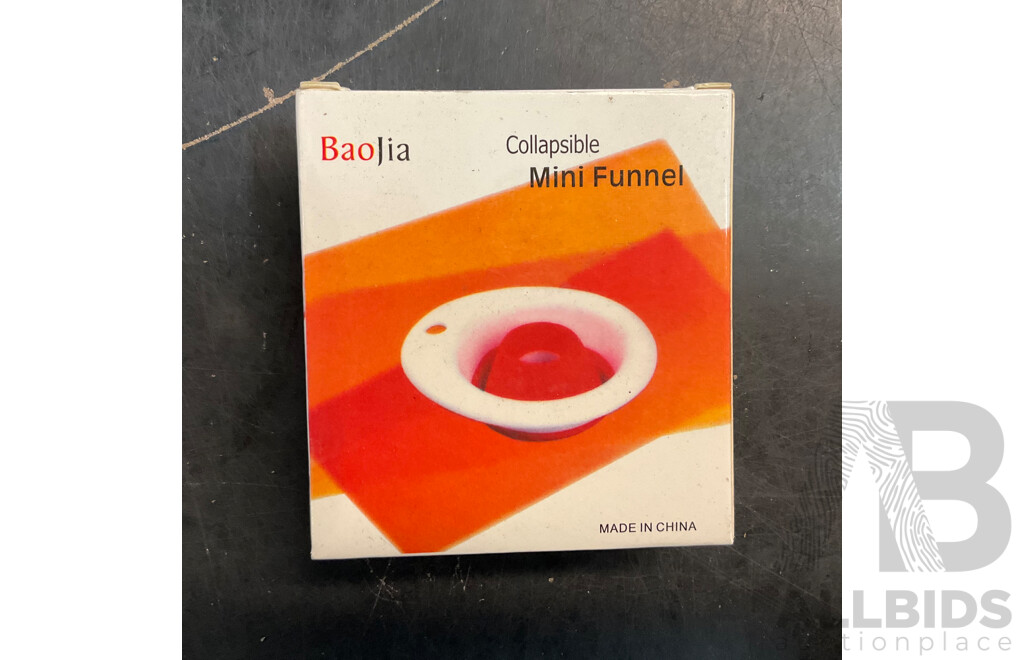 Mixed Lot Includes Passport Wallet, Soy Sauce Dispenser, Nose Hair Remover, Mini Flashlight, and Assorted Baking Items and More.