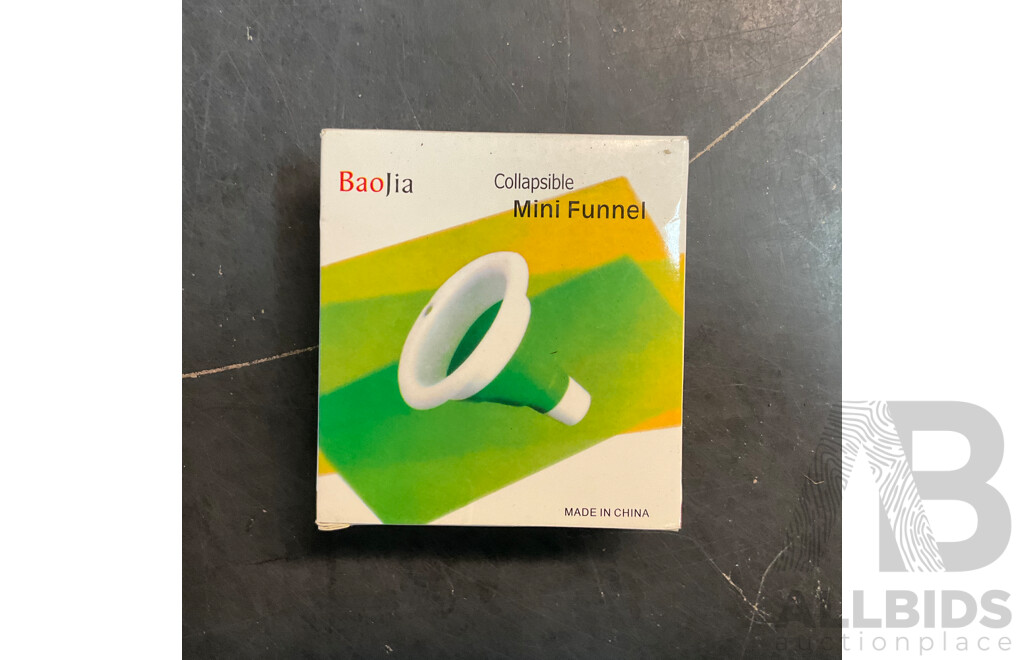 Mixed Lot Includes Passport Wallet, Soy Sauce Dispenser, Nose Hair Remover, Mini Flashlight, and Assorted Baking Items and More.